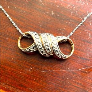 Striking 925 Necklace and pendant with gold tone back. Sterling Silver marked.